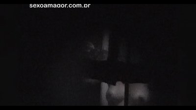 Blonde girl secretly videotaped by neighbourhood voyeur hidden behind hollow bricks